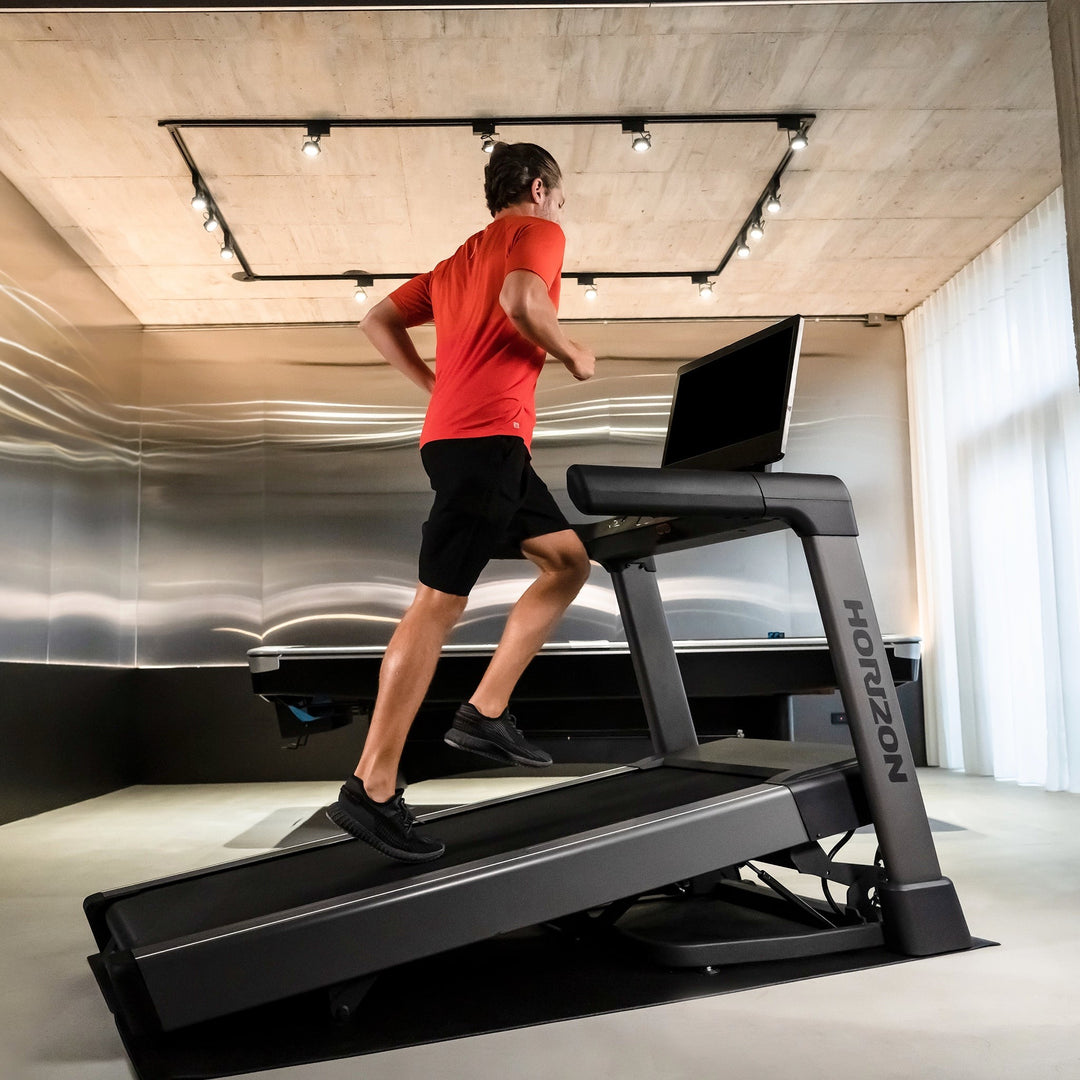 Horizon Tread XP shown from a workout angle in a home setting.